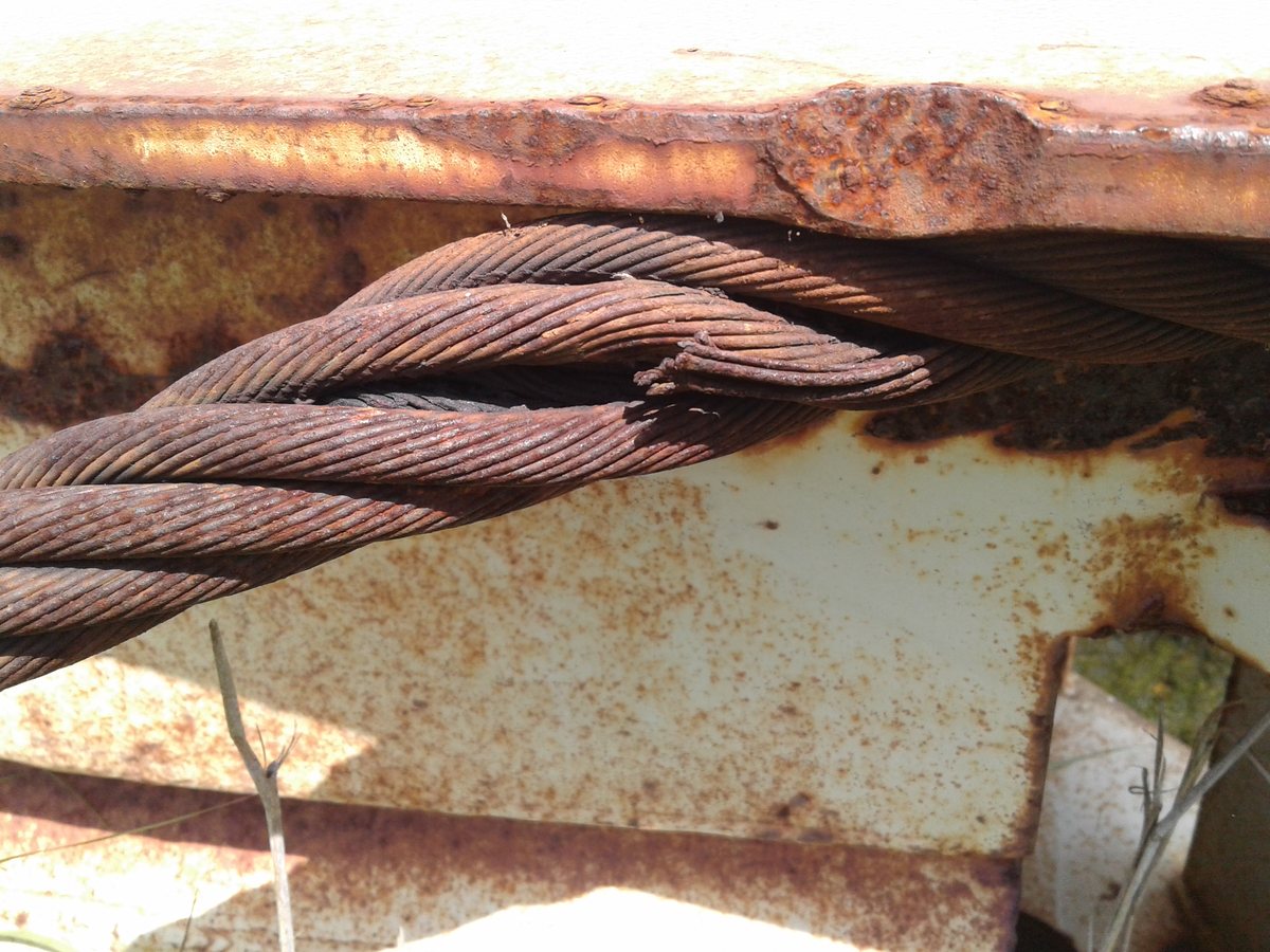 Worn wire rope strands on structure